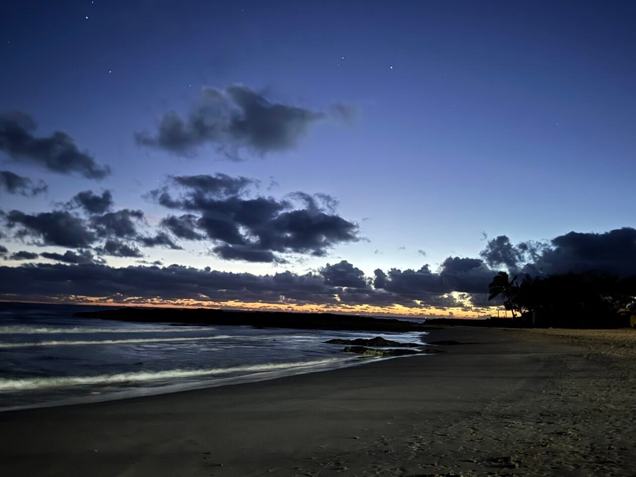 grey blue sunrise over ocean