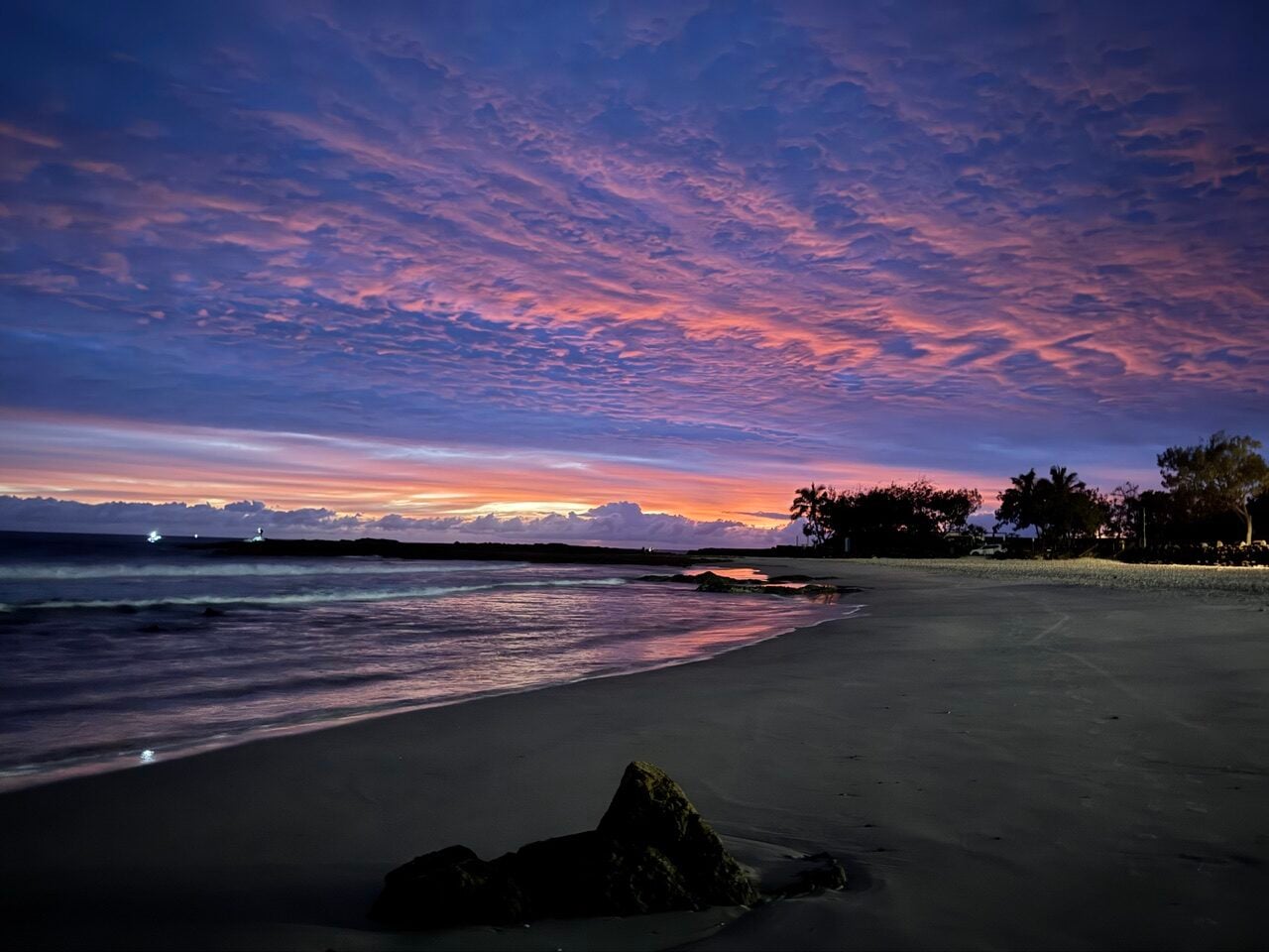 pinks and blues of a sunrise over the ocean