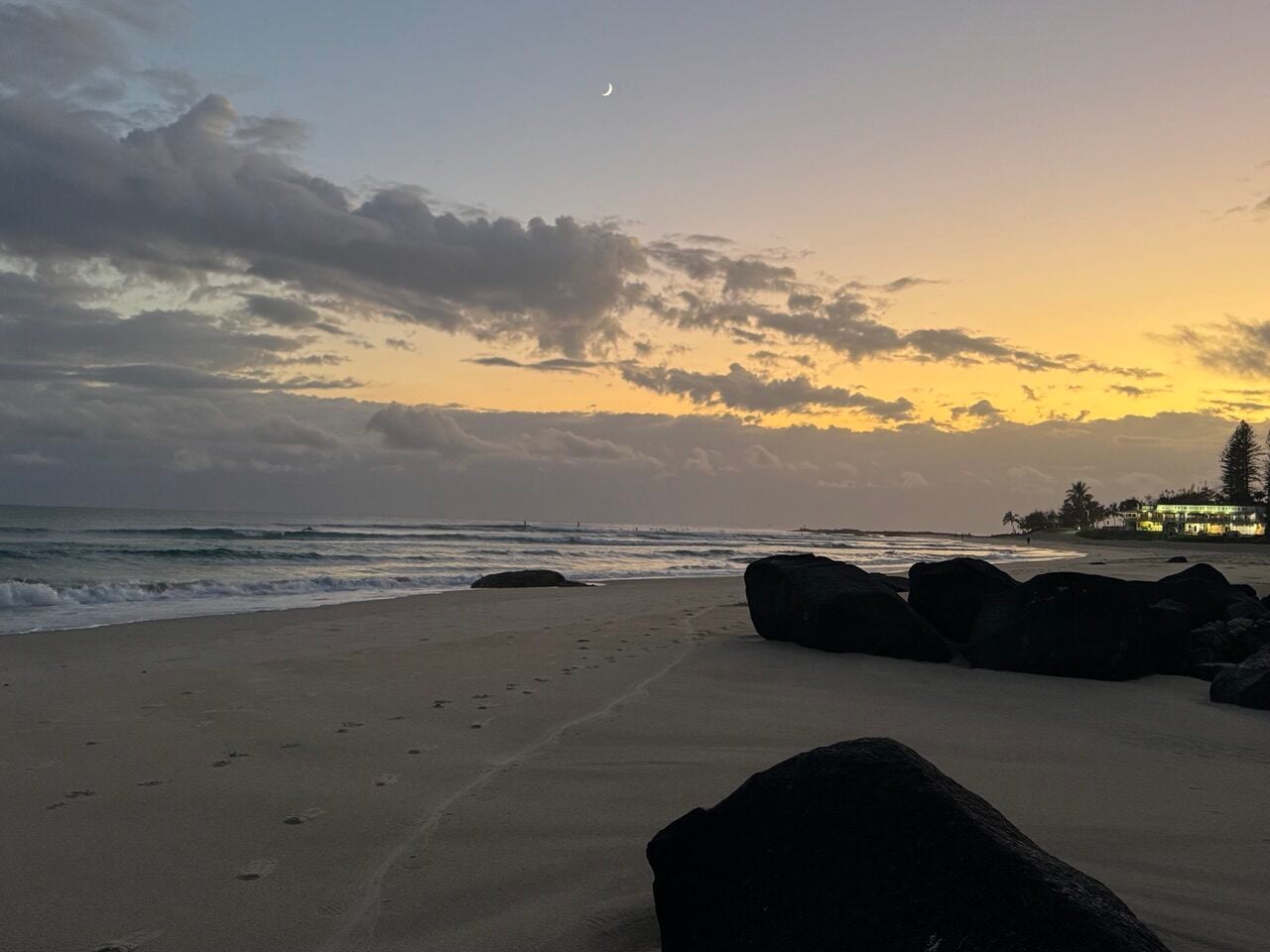 grey yellow sunrise over ocean